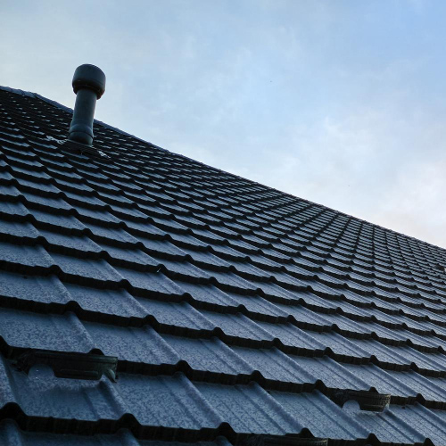 Travail de couverture sur toiture ancienne